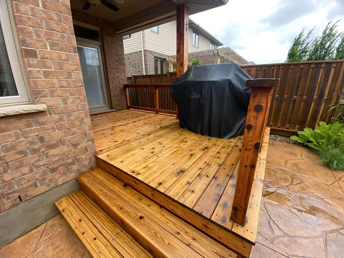 Deck surface after washing showing natural wood ready for Deck Medic staining