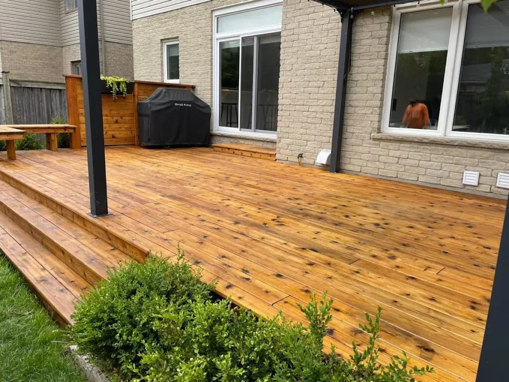 Deck refinishing in progress showing smooth sanded surface by Deck Medic