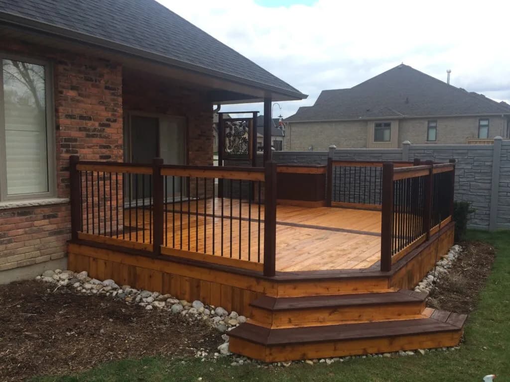 Deck boards showing deep stain penetration after proper preparation by Deck Medic